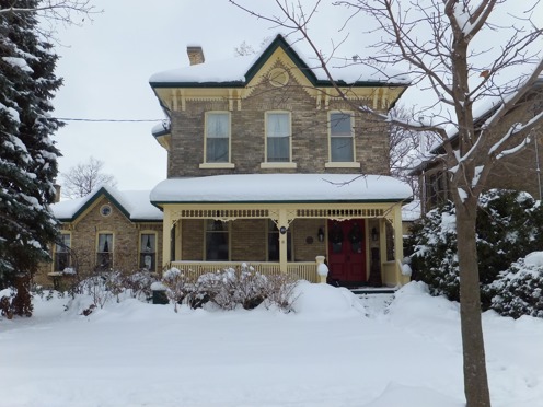 Yellow brick Italianate style house