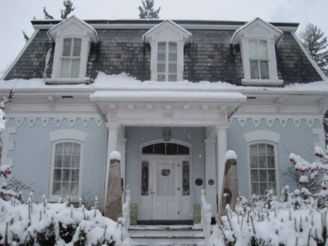 Light grey painted brick, Second Empire style house